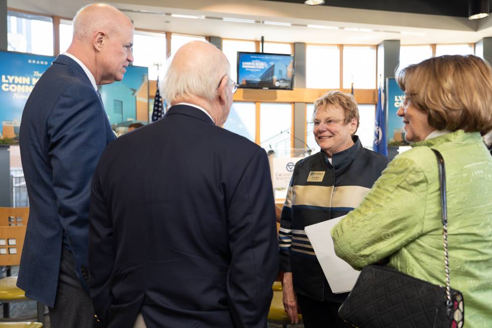 Lynn Blue talking with friends at the Lynn M. Blue Connection Naming Ceremony